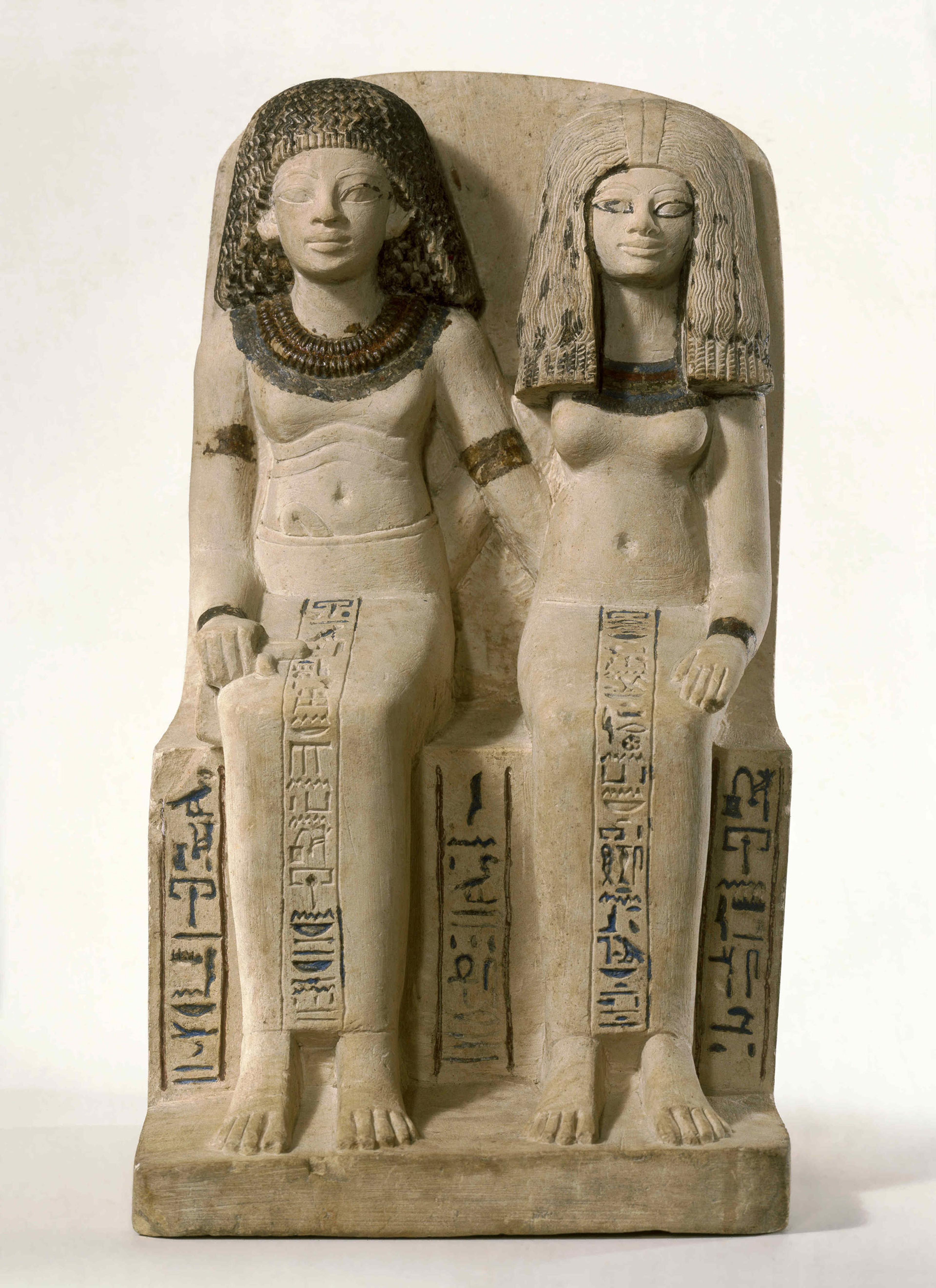 Pair Statue of Nebsen and Nebet-ta. Egypt, possibly from Dahamsha. New Kingdom, Dynasty 18, early in the reign of Amunhotep III, circa 1400–1352 B.C.E. Limestone, painted, 153⁄4 x 89⁄16 x 91⁄4 in. (40 × 21.8 × 23.5 cm). Brooklyn Museum, Charles Edwin Wilbour Fund, 40.523