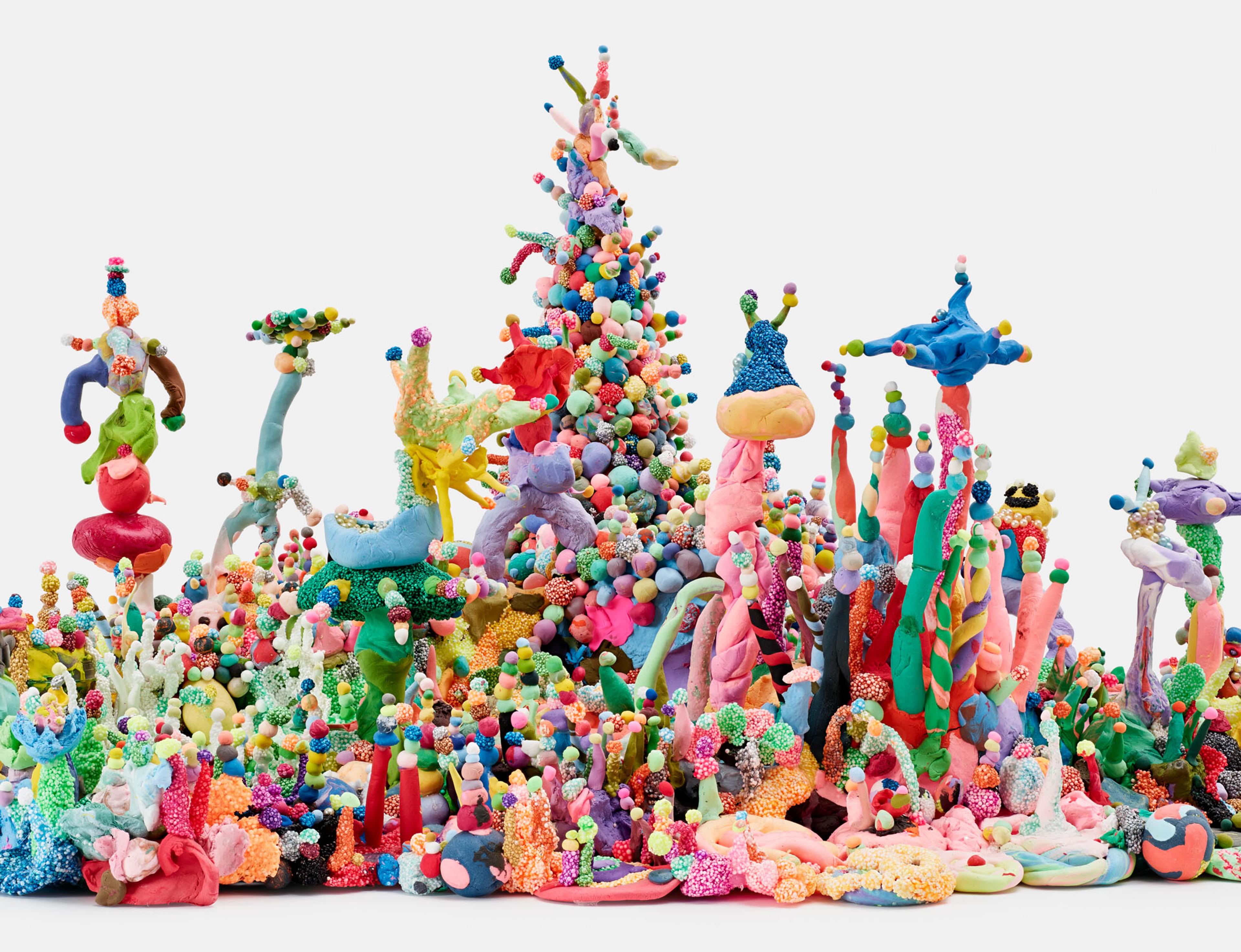 A dense, colorful sculptural landscape