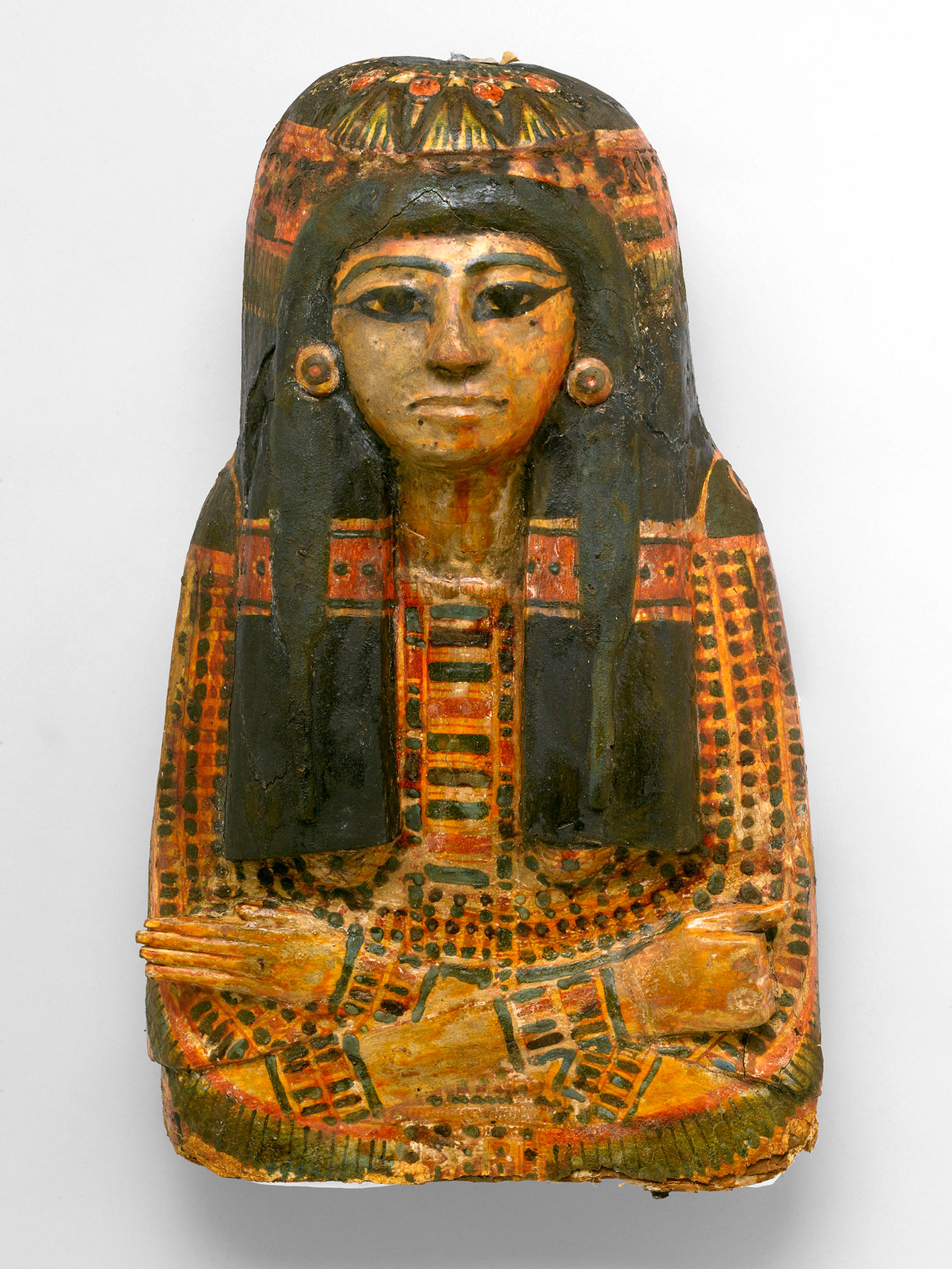 Mummy Mask of Bensuipet, Deir el-Medina, Egypt, circa 1292–1190 B.C.E. Cartonnage, 71/4 x 141/4 x 243/8 in. (18.4 x 36.2 x 62 cm). Charles Edwin Wilbour Fund, 37.47Ec. (Photo: Sarah DeSantis, Brooklyn Museum)