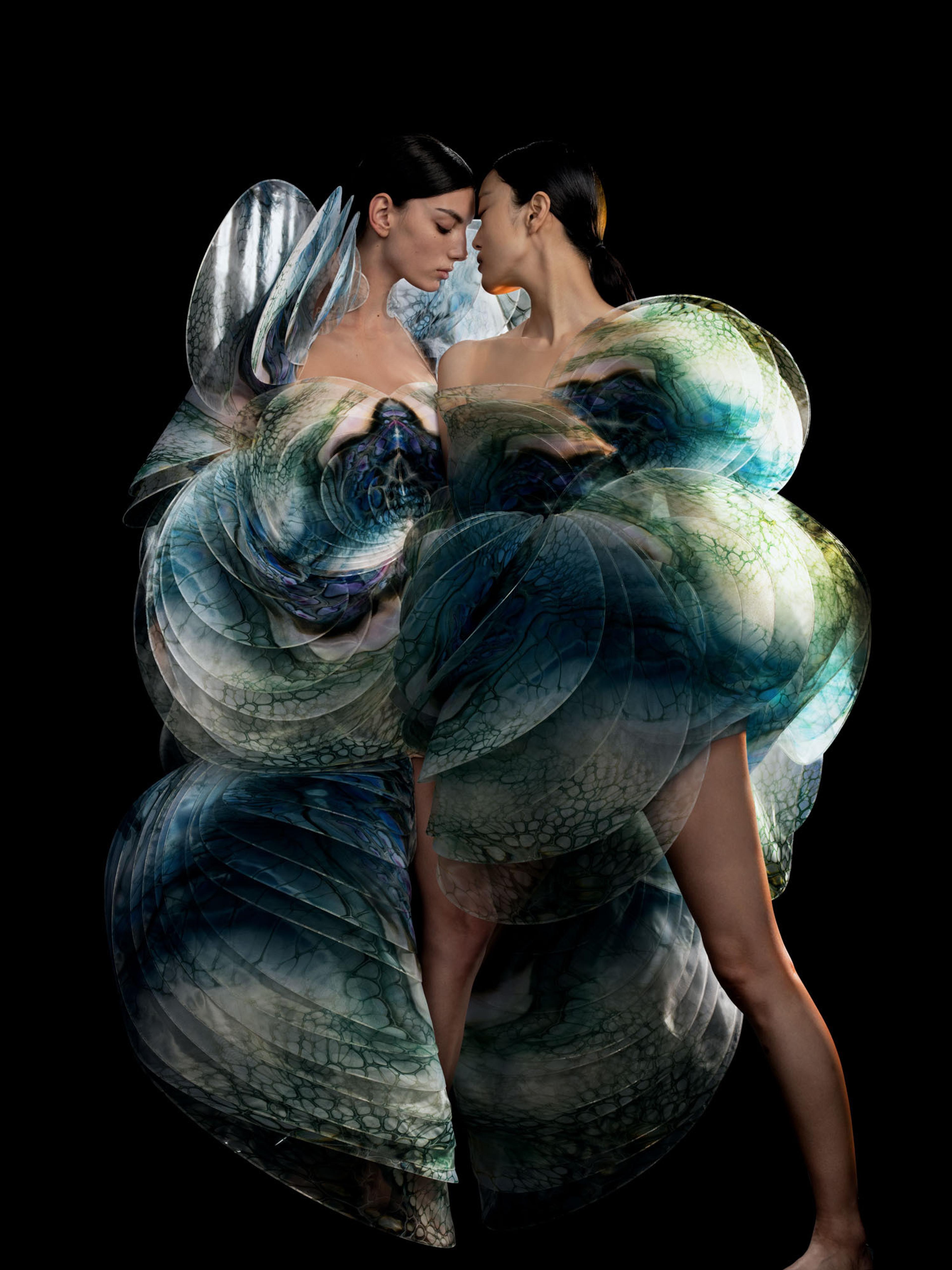 Iris van Herpen. <i>Sensory Seas</i> Dress, from the <i>Sensory Seas</i> collection, 2020. PETG and glass organza. Collaborator: Shelee Carruthers. Models: Cynthia Arrebola and Yue Han. (Photo: David Ụzọchukwu)