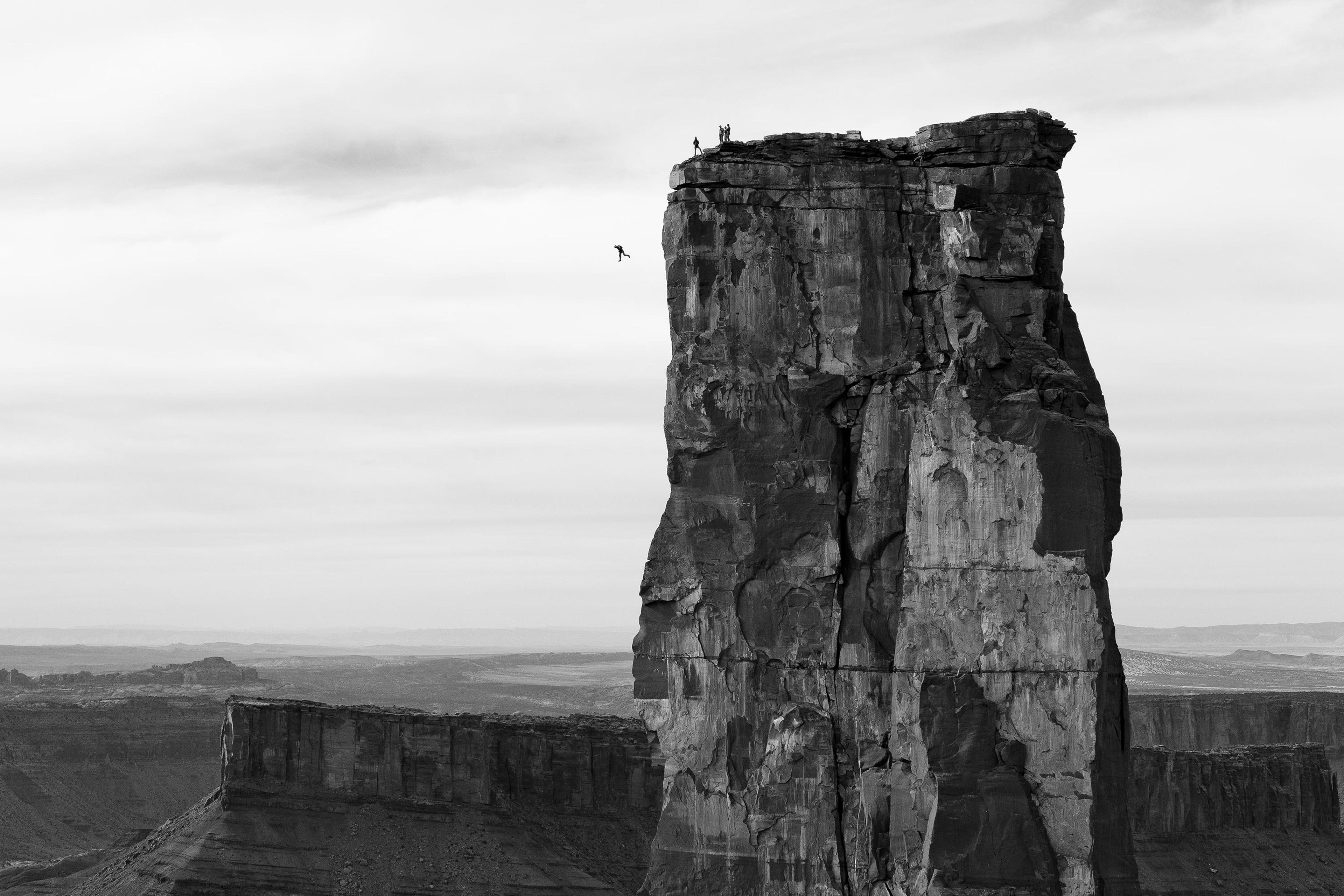 Krystle Wright (Australian, born 1987). Freefall, Michael Tomchek leaps off Castleton Tower (400ft) as fellow BASE jumpers look on, Castle Valley, Utah, 2010, printed 2016. Inkjet print, 131⁄4 x 20 in. (33.9 x 50.8 cm). Collection of Krystle Wright