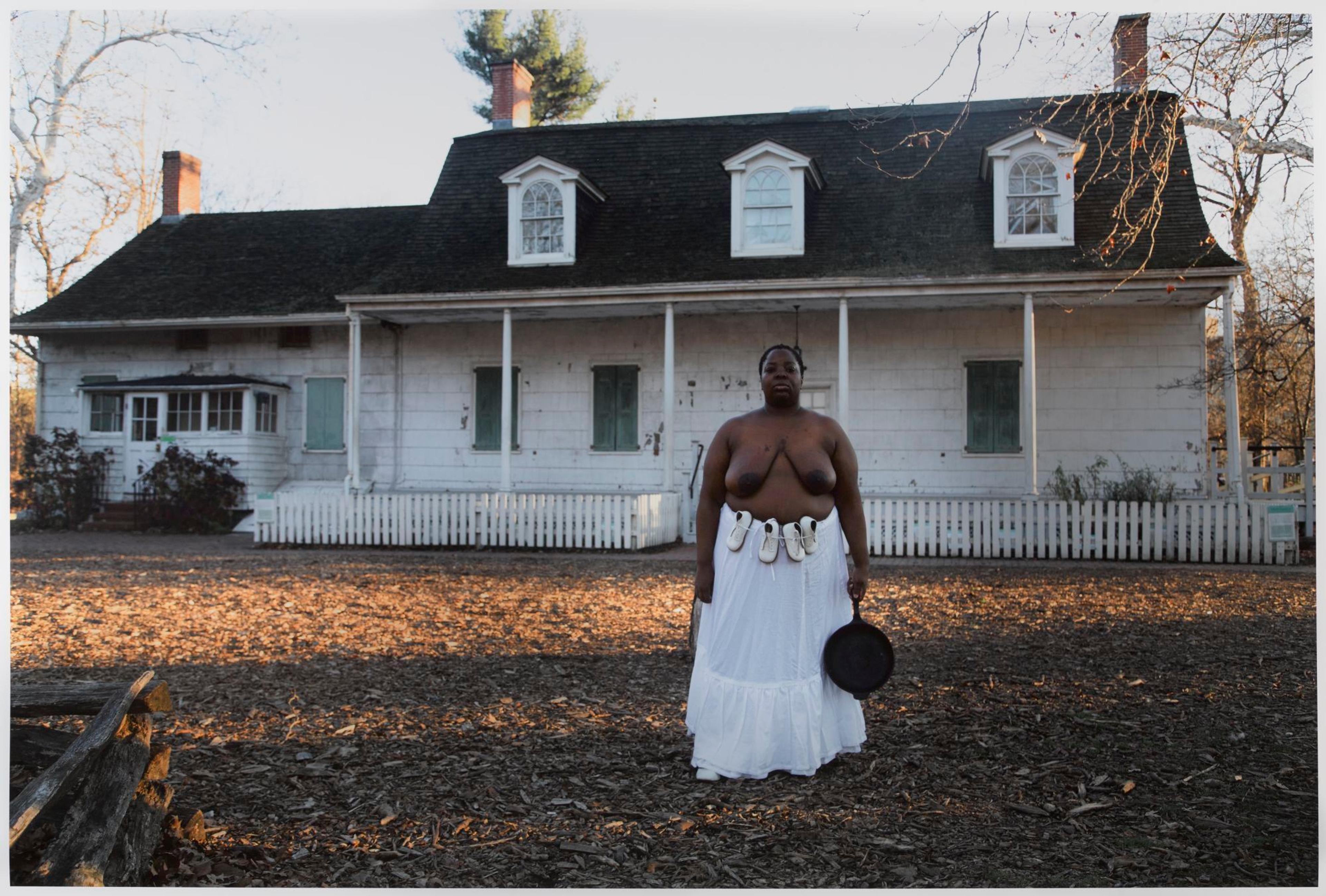 Nona Faustine (born New York City, New York, 1977). Isabelle, Lefferts House, Brooklyn, 2016. Chromogenic photograph, 28 × 42 in. (71 × 106.7 cm). Brooklyn Museum; Winthrop Miles Fund, 2017.41.2. © Nona Faustine. (Photo: Jonathan Dorado, Brooklyn Museum)