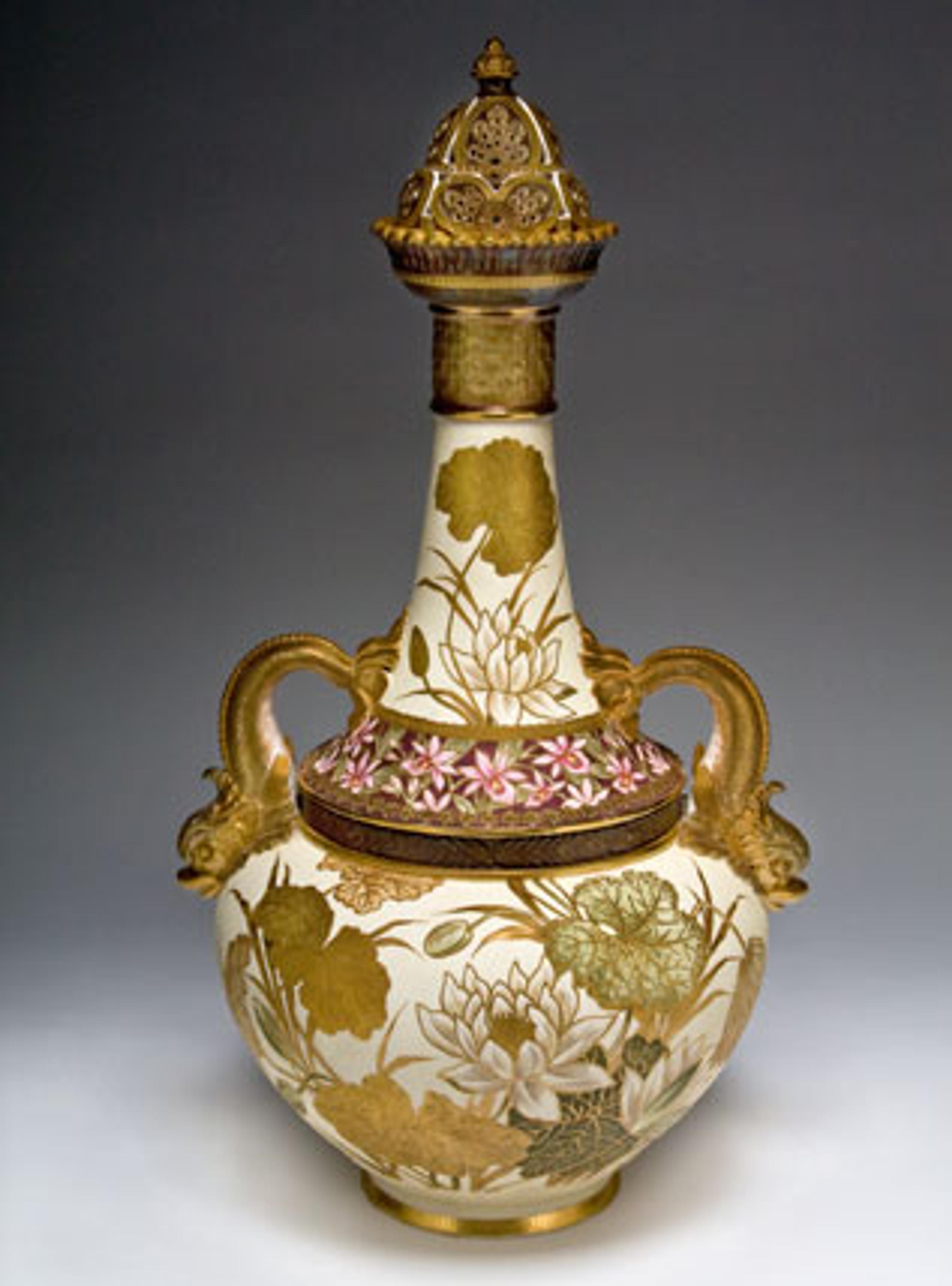 Edward Lycett (American, b. England, 1833–1910). Faience Manufacturing Company (1881–92). Covered Vase, 1889. Cream-colored earthenware with ivory glazed ground painted with polychrome enamels; flat and raised gold paste decoration. The Henry Ford, Dearborn, Michigan, 60.135