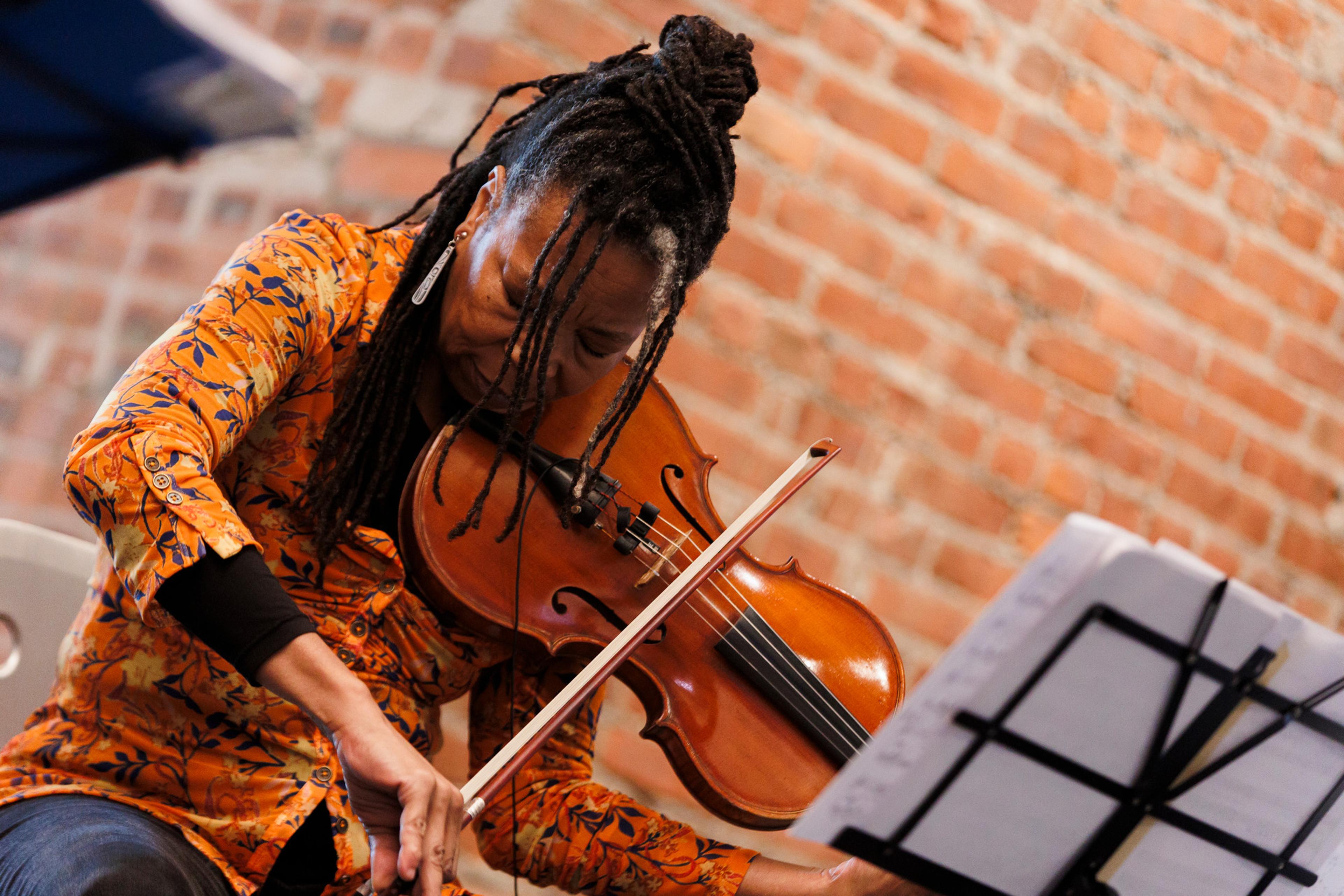 A musician playing a violin