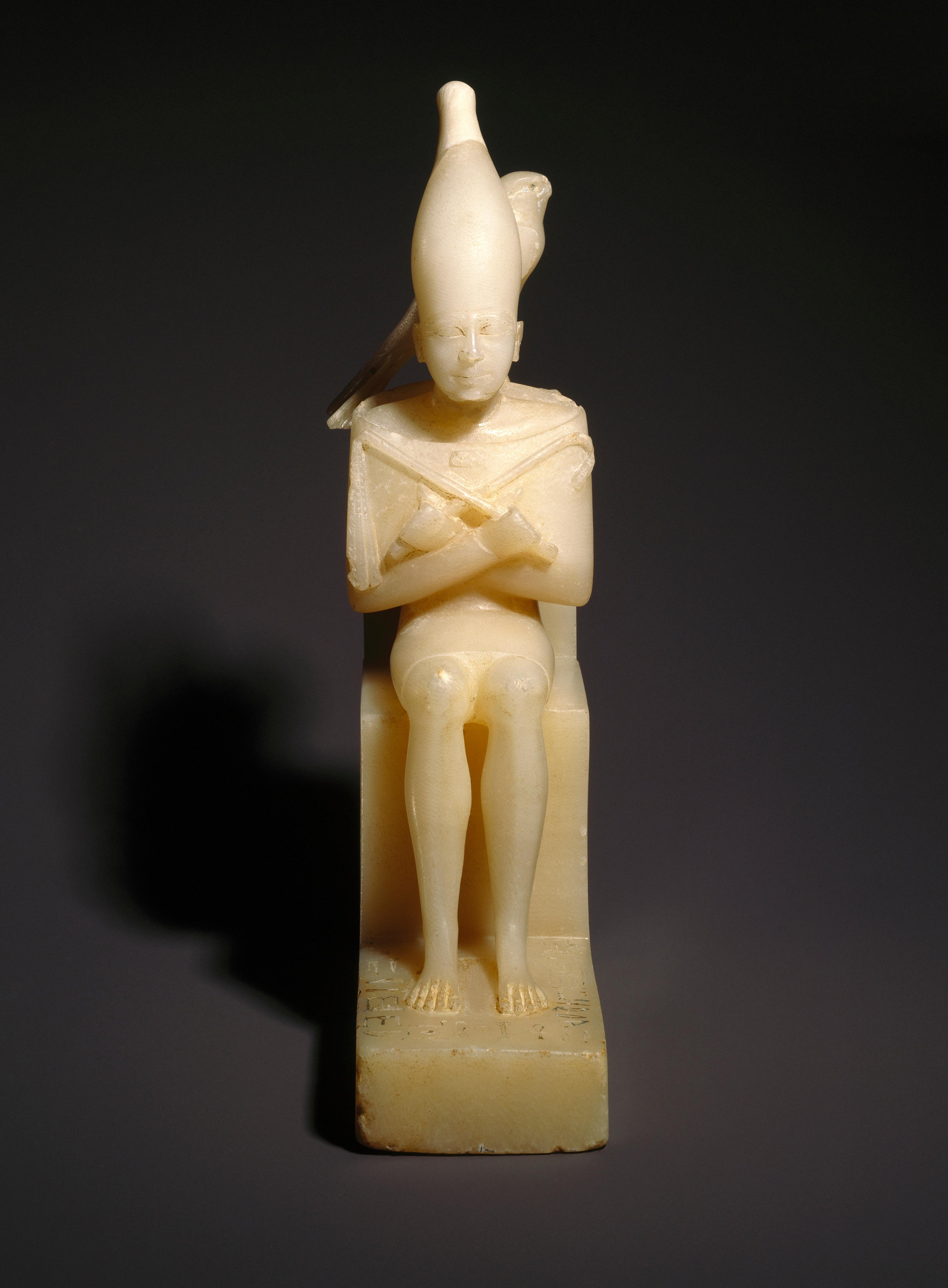 Pepy I with Horus Falcon. From Upper Egypt. Old Kingdom, Dynasty 6, reign of Pepy I, circa 2338–2298 B.C.E. Egyptian alabaster, 107/16 in. (26.5 cm) high. Brooklyn Museum; Charles Edwin Wilbour Fund, 39.120. (Photo: Brooklyn Museum)