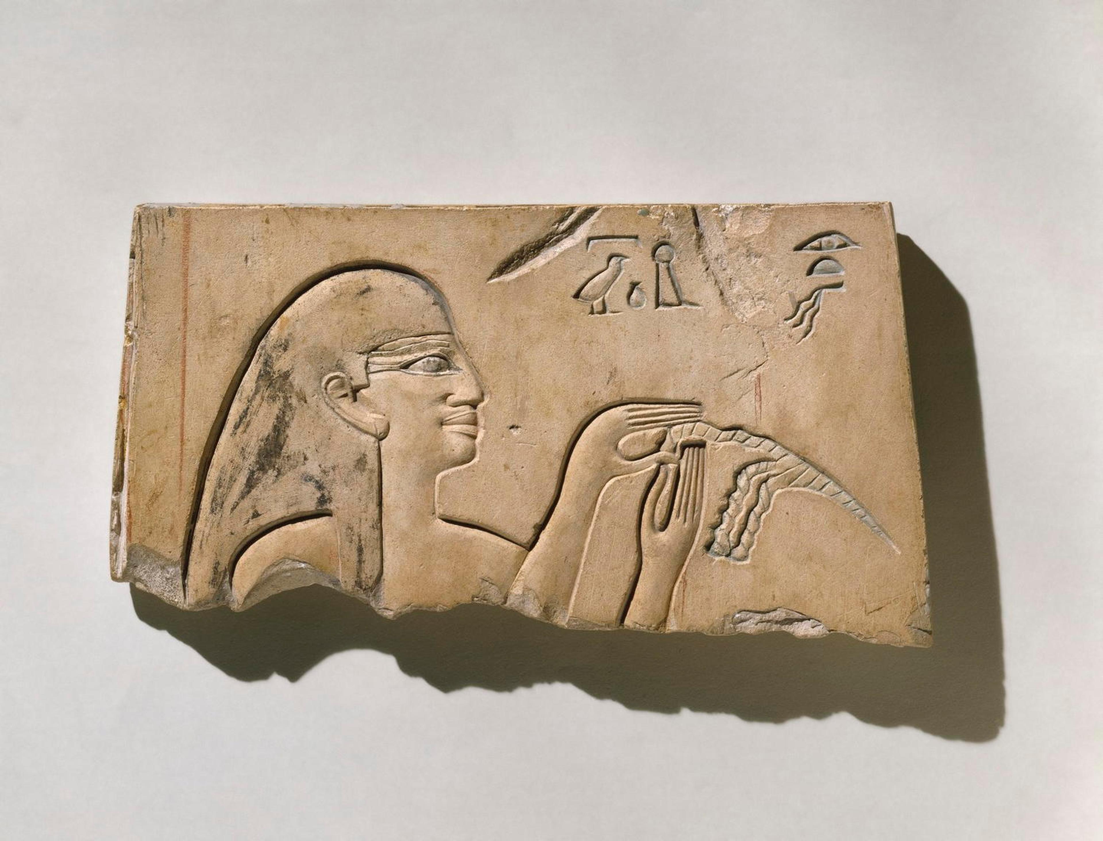 Egyptian. <i>Hairdressing Scene</i>, ca. 2008–1957 B.C.E.. Limestone, pigment, 5 3/16 x 9 5/8 in. (13.2 x 24.5 cm). Brooklyn Museum, Charles Edwin Wilbour Fund, 51.231. (Photo: Brooklyn Museum)